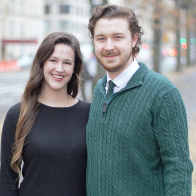 A woman and a man in sweaters